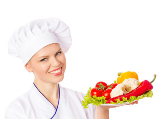Happy smiling chef with a dish of healthy food . Isolated