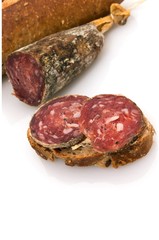 Slices of ​​sausage on bread.