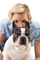 Woman with her dog over white background