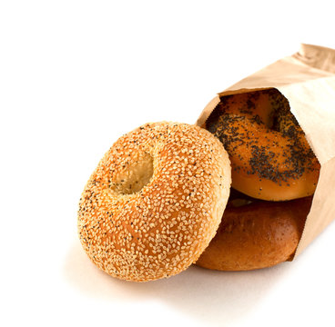 Assorted Bagels In Brown Paper Bag