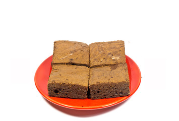 Brownie cake on the red dish