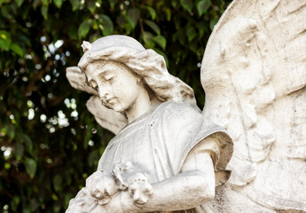 Naklejka premium Beautiful ancient female angel sculpture