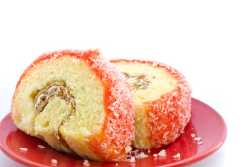 Strawberry yam roll on the red dish