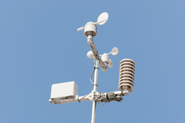 weather station against blue sky