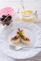 eggs with ham and black olive ones
