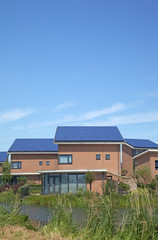 Fototapeta na wymiar new family building with solar panels