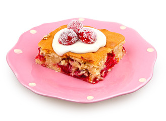 cranberries dessert with cream cheese topping on pink plate