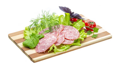 Sausages with salad and basil