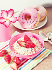 cereal with fresh strawberry with doughnuts