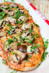 pita baked with tomato sauce and mushrooms