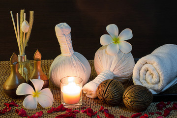 thai spa massage setting on candlelight