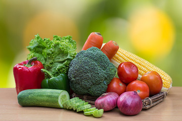 Variety of fresh vegetables on wood table