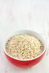 flakes in red bowl
