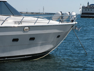 bowsprit of luxury speed boat in seaport