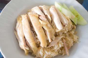 sliced Hainan-style chicken with marinated rice