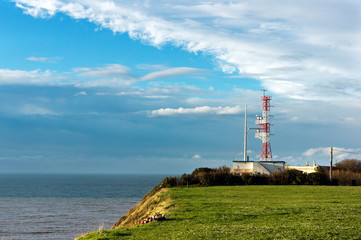 Fototapeta na wymiar radar tower near the sea