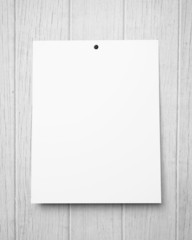 blank poster on a wood wall