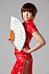 Chinese model in traditional Cheongsam dress