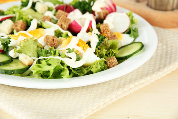 Fresh mixed salad with eggs, salad leaves and other vegetables,