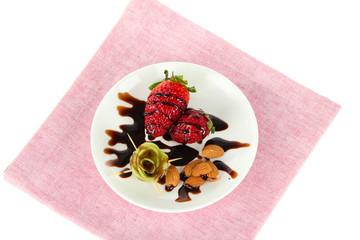 Fruit in chocolate on a napkin