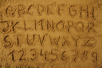 alphabet  in the sand