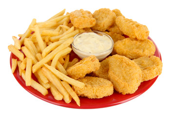 Fried chicken nuggets with french fries and sauce isolated