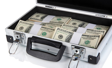 Suitcase with 100 dollar bills isolated on white