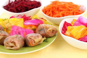 Stuffed cabbage rolls on beige background close-up