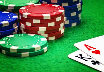 Ace, king and poker chips stack