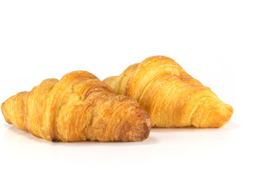 fresh and tasty croissant on white background