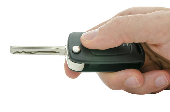 Detail of male hand holding car key