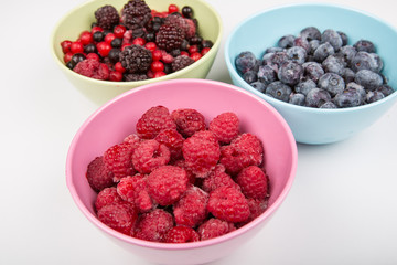 Fresh ripe berries: raspberry, blueberry and red currant