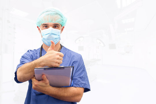 Doctor physician approval OK hand sign isolated in operating roo