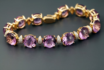 Golden jewelry  bracelet with amethysts