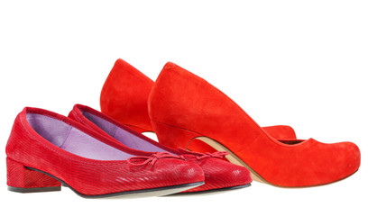 Two pairs of red woman pumps shoes