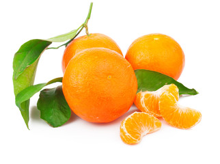 Fresh mandarin fruits with green leaves, isolated on white