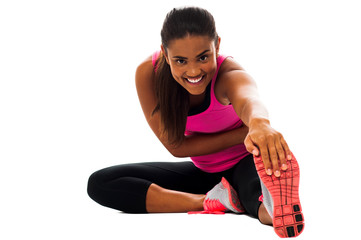 Fitness girl doing stretching exercise