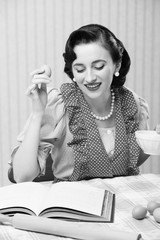 Girl reads a cookbook