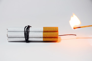 Cigarette bomb and Matches isolated on white background