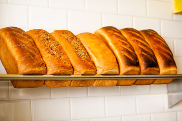 Freshly kneaded grain and white breads for sale