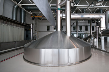 Steel fermentation vat on brewer factory