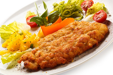 Fried pork chop and vegetable salad
