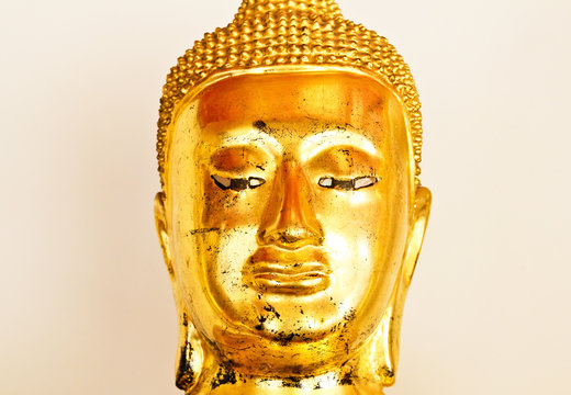 Close up image of golden buddha sculpture From Wat Pho Temple, b