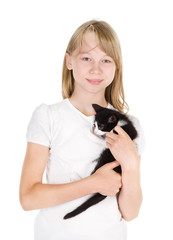 Portrait of a teenage girl with her pet cat. isolated
