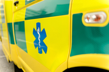 Paramedic symbol on yellow ambulance car © CandyBox Images