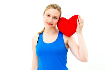 woman holding a red heart