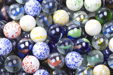 various marbles close up on the white