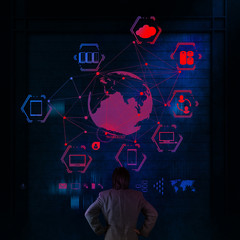 Businessman working with a Cloud Computing diagram on the new co