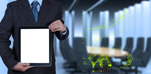 businessman success working with blank tablet computer his board