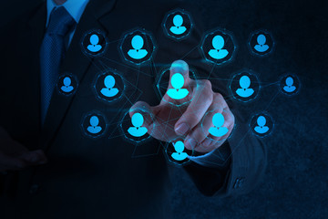 businessman hand points human resources, CRM and social media
